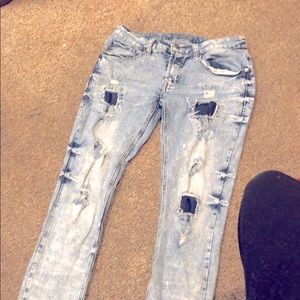 Black branded ripped jeans